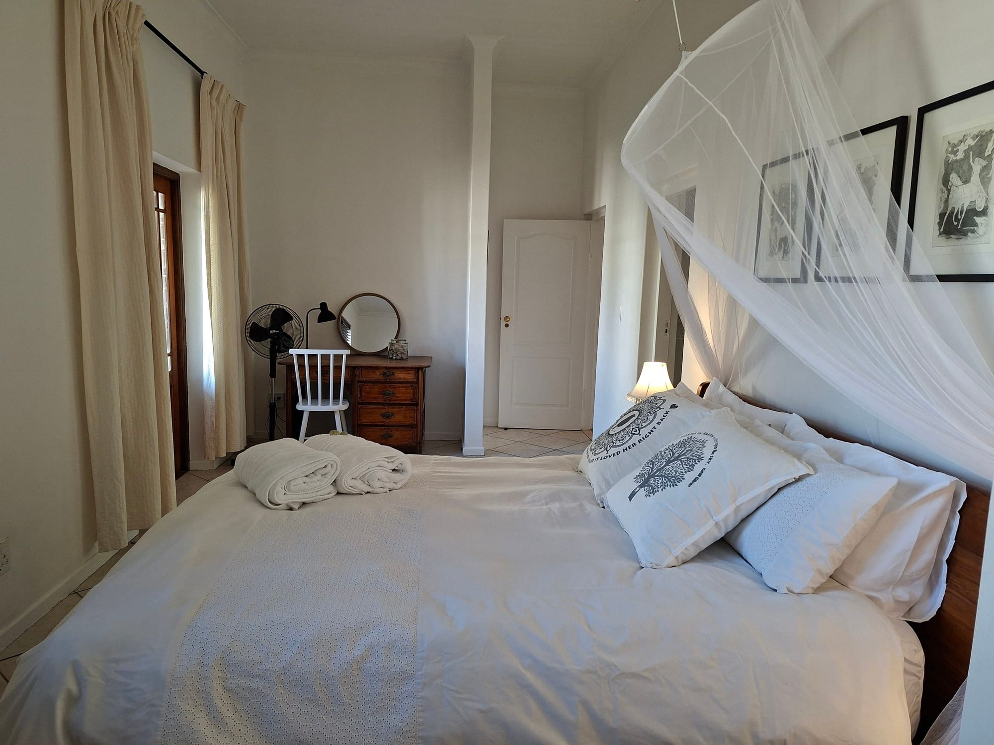 The bright and sunny main bedroom of the home Songbird in Yzerfontein