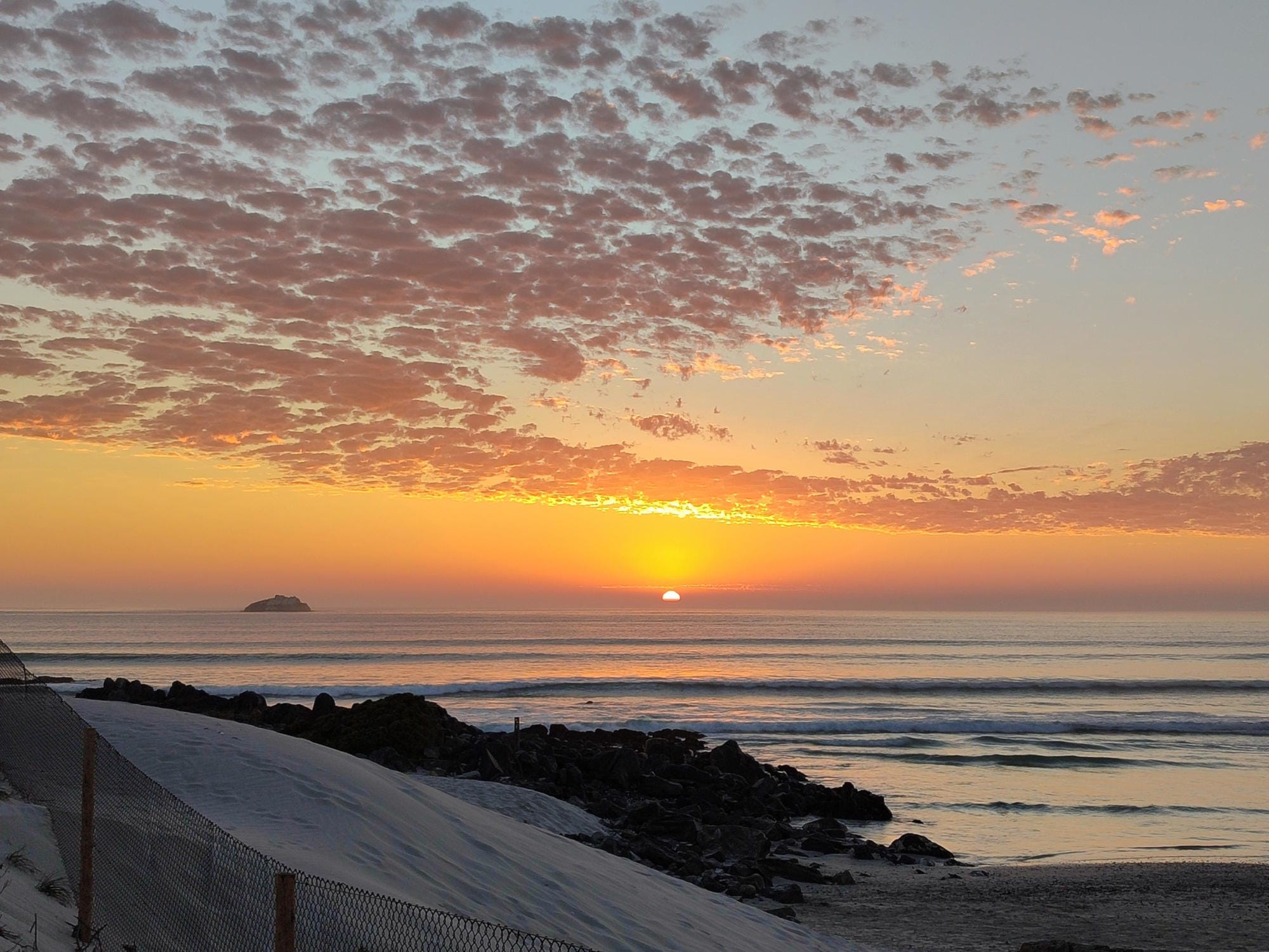 Sunset over the sea on the West Coast as seen from our viewing deck in Yzerfontein